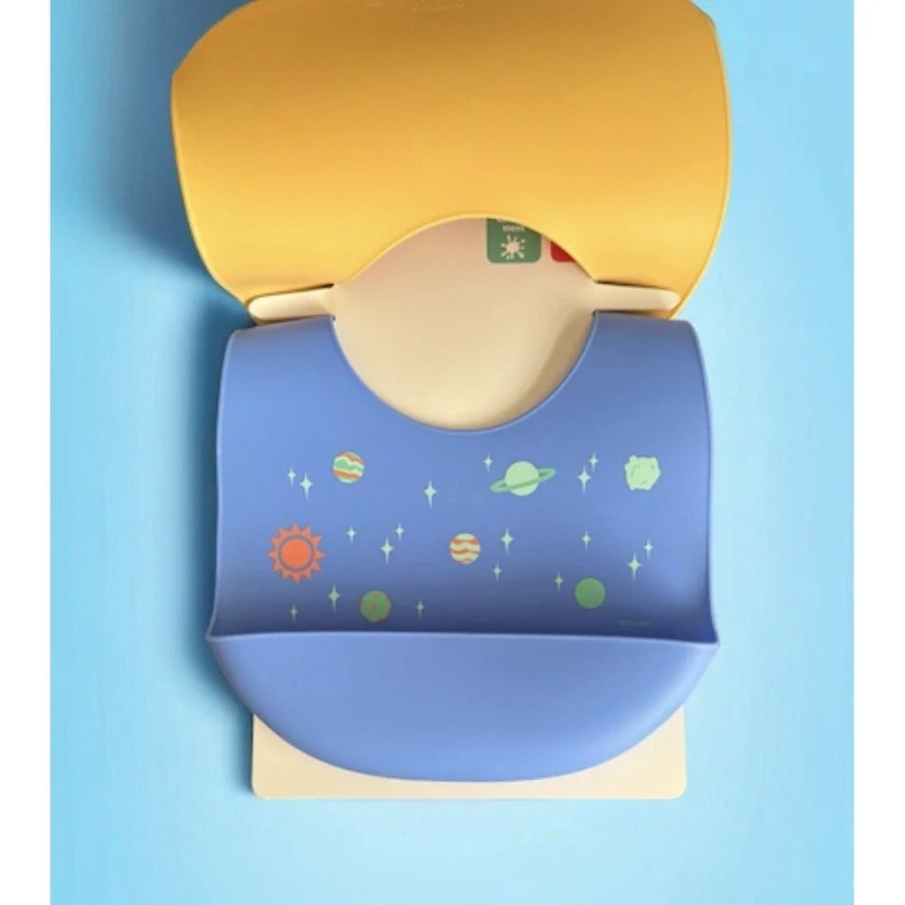 Nuby On-the-Go Silicone Feeding Bib with Scoop - Easy-to-Clean - BPA Free